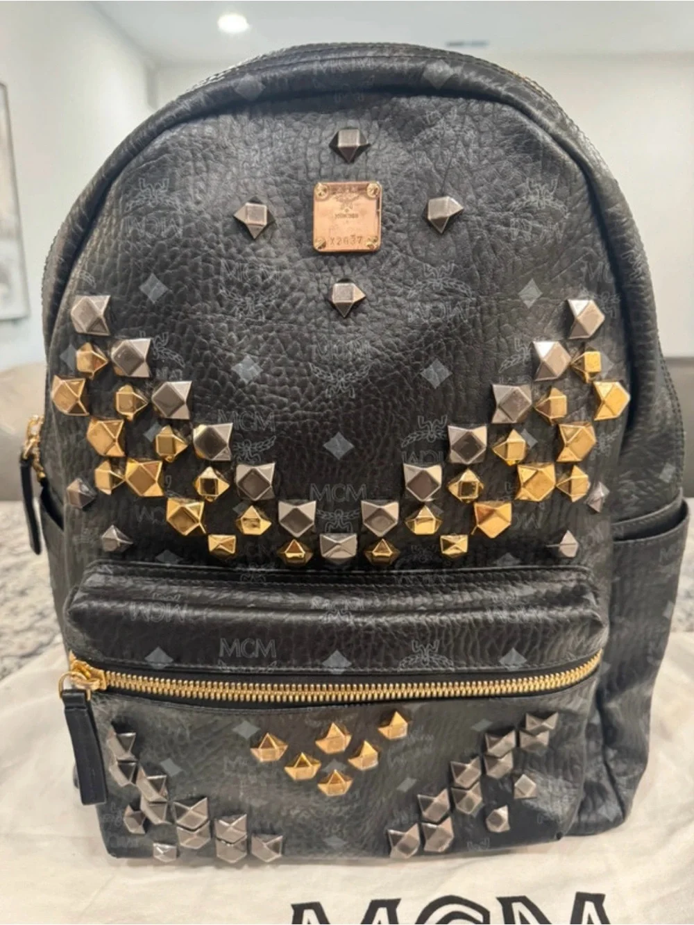 MCM Black Leather Backpack with Gold & Silver Studs